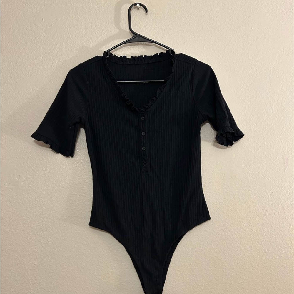 Women’s black ribbed body suit